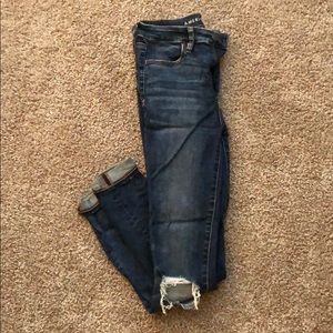 Blown Out Knee Jeans